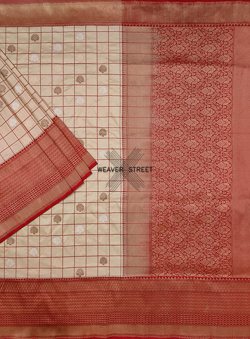 Beige katan silk handwoven Banarasi saree with kadwa buti in checks. 1 MAIN
