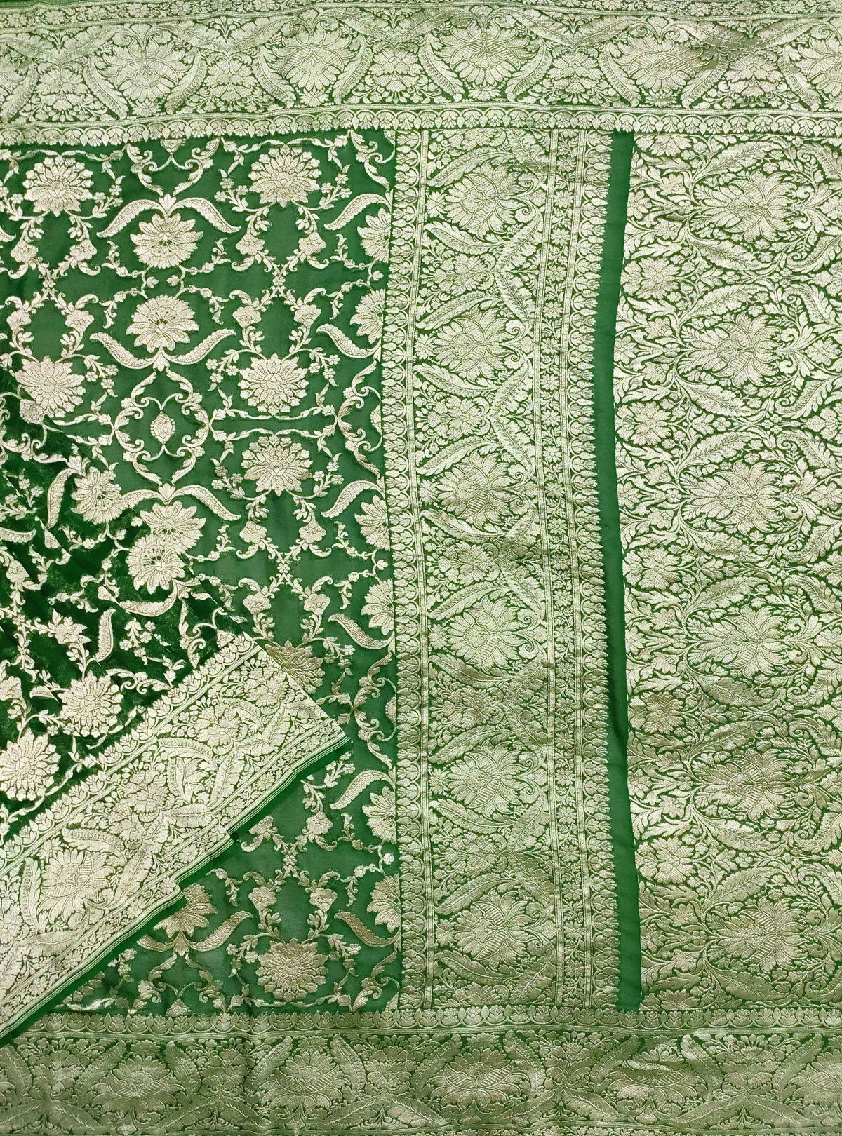 Emerald green Khaddi georgette Handwoven Banarasi saree with asthetic jaal (1) Main