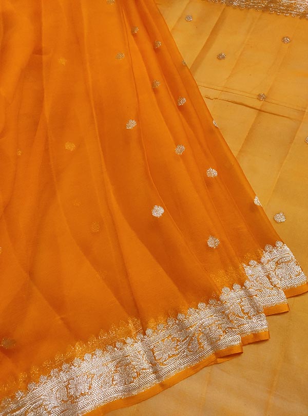 Orange light weight chiffon handloom Banarasi saree with silver booti (3) center