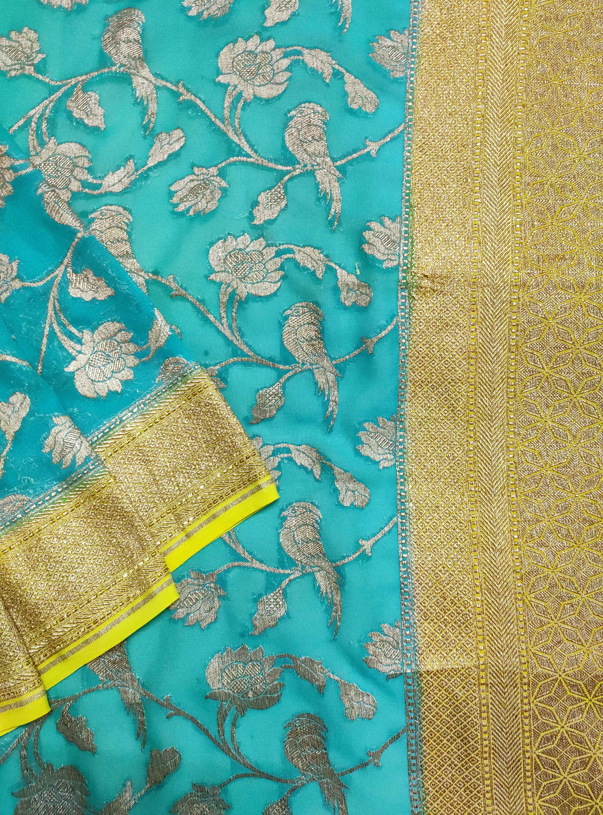 Turquoise Khaddi georgette Handwoven Banarasi saree with flower and bird jaal (2) Close up