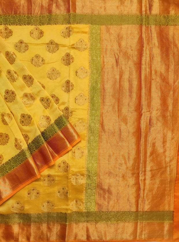 Yellow muga chiniya silk Banarasi saree with handpainted meenedar flower booti (1) Main