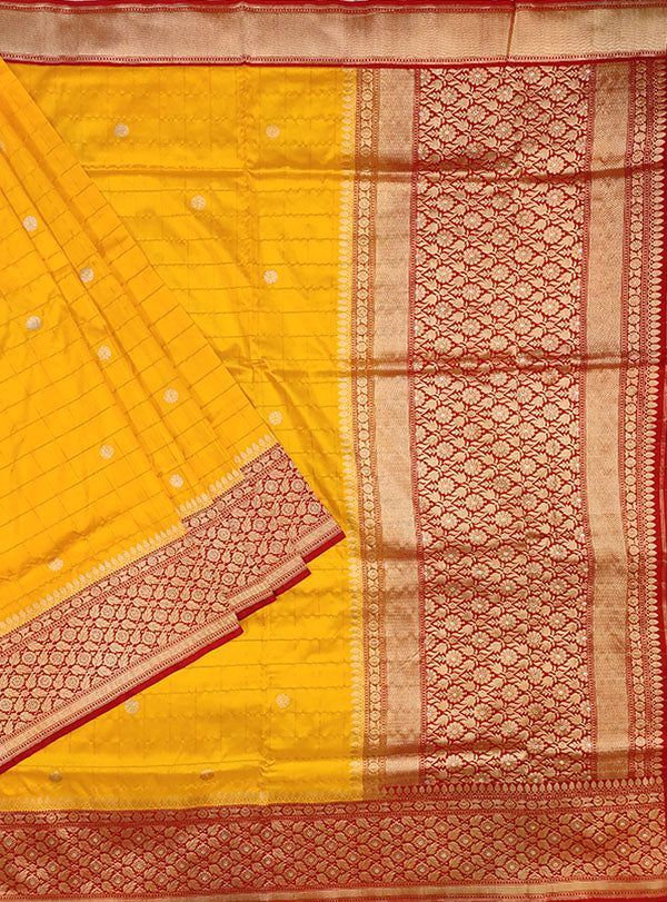 Yellow katan silk Banarasi saree with small flower booti inside grid (1) main